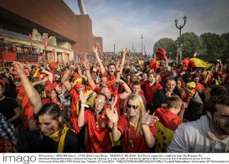 BRUSSELS, BELGIUM: Red Devils supporters celebrate near the Brussels Roi Baudouin-Koning Boudewijn stadium during the viewing on a big screen of the soccer game in Belo Horizonte, the first game in Group H of the first round of the 2014 FIFA World Cup, Tuesday 17 June 2014. 