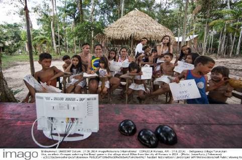COPA2014 Manaus, AM - 17.6.2014: - Indigenous Village Tururukari Uka, an ethnic Omagua watching the Brazil game in the village about 80km from the city of Manaus in 2014 . (Photo: JonneRoriz Fotoarena) - x(5115)xJonnexRorizx xFotoarenax 