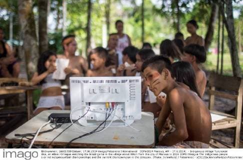 COPA2014 Manaus, AM - 17.6.2014: - Indigenous Village Tururukari Uka, an ethnic Omagua watching the Brazil game in the village about 80km from the city of Manaus in 2014 COPA Omagua The indigenous people s er ind indigenouotball championships and the current champiompion in the category. (Photo: JonneRoriz Fotoarena) - x(5115)xJonnexRorizx xFotoarenax 
