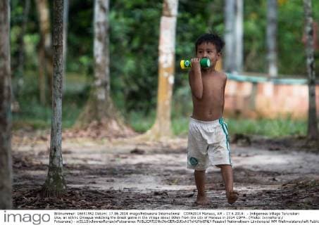 COPA2014 Manaus, AM - 17.6.2014: - Indigenous Village Tururukari Uka, an ethnic Omagua watching the Brazil game in the village about 80km from the city of Manaus in 2014 COPA . (Photo: JonneRoriz Fotoarena) - x(5115)xJonnexRorizx xFotoarenax 