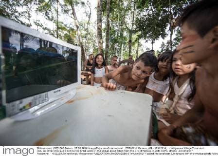COPA2014 Manaus, AM - 17.6.2014: - Indigenous Village Tururukari Uka, an ethnic Omagua watching the Brazil game in the village about 80km from the city of Manaus in 2014 COPA. (Photo: JonneRoriz Fotoarena) - x(5115)xJonnexRorizx xFotoarenax 
