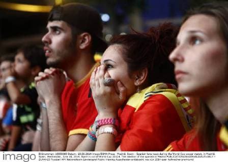 Madrid, Spain - Spanish fans react during the World Cup soccer match, in Madrid, Spain, Wednesday, June 18, 2014. Spain is out of World Cup 20114. The reaction of the spanish in Madrid  - ZUMAn23