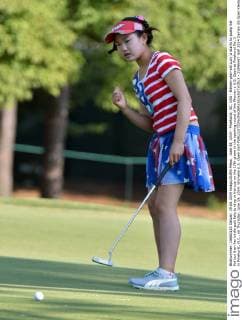 June 19, 2014 - Pinehurst, NC, USA - Eleven-year-old Lucy Li starts to pump her fist but then her birdie putt fails to drop in the cup on the 17th green in the opening round of the Women s U.S. Open at Pinehurst No. 2 in Pinehurst, N.C., on Thursday, June 19, 2014. Womens U.S. Open Golf - ZUMAm67