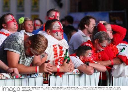 Peterborough, UK . . 19.06.2014 England fans dejection at the Sports Lounge in Peterborough, UK, England in the World Cup. 