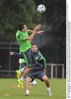 29200614DDI_ENT_MEX_HERRERA Action photo during Training Seleccion Mexicana, carried dig at the club Santos, pictured: Hector Herrera and Isaac Brizuela 20 06 2014 xADRIANxMACIASx 
