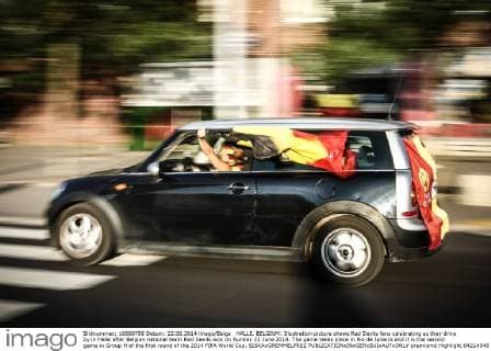 HALLE, BELGIUM: Illustration picture shows Red Devils fans celebrating as they drive by in Halle after Belgian national team Red Devils won on Sunday 22 June 2014. The game takes place in Rio de Janeiro and it is the second game in Group H of the first round of the 2014 FIFA World Cup. SISKAxGREMMELPREZ  premiumd Highlight 04214548