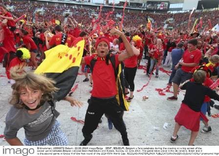 GENT, BELGIUM: Belgium s fans celebrate during the viewing on a big screen of the soccer game between Belgian national team Red Devils and Russia, Sunday 22 June 2014. The game takes place in Rio de Janeiro, Brazil and it is the second game in Group H of the first round of the 2014 FIFA World Cup. NICOLASxMAETERLINCK  premiumd Highlight 04214287