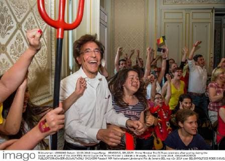 BRUSSELS, BELGIUM: Prime Minister Elio Di Rupo celebrate after scoring during the soccer game as part of the 2014 FIFA World Cup at the Prime Minister s cabinet in Brussels, Sunday 22 June 2014. JONASxROOSENS  04214398