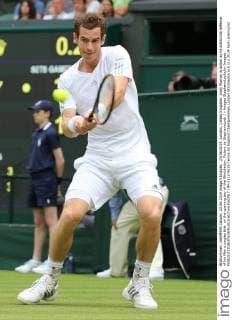 23 06 2014. London, United Kingdom. Andy Murray in action as he starts the defence of his Men s singles title on the opening day of the Wimbledon. Picture by StephenxLock i-Images StephenxLockx xi-Images  IIM-2512-0029