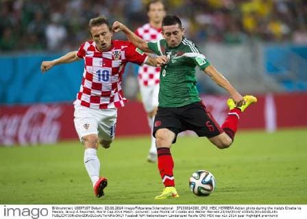 37230614DDI_CRO_MEX_HERRERA Action photo during the match Croatia vs Mexico, Group A Reported, World Cup 2014 Match, pictured: Luka Modric of Croatia and Hector Herrera 23 06 2014 xOSVALDOxAGUILARx 