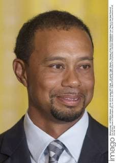 US golfer Tiger Woods - Member of the 2013 Presidents Cup Team in the East Room of the White House in Washington DC, on June 24, 2014.  WAX20140624204