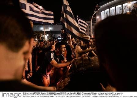 June 24, 2014 - Thousands of Greeks gathered under the White tower in Thessaloniki to celebrate the qualification of the Greek team to next phase of World Cup 2014 . Greeks celebrate after the qualification of the Greek team to the next phase of World Cup 2014  - ZUMAn23