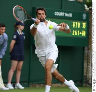 TENNIS - ATP, Wimbledon 2014 LONDON,ENGLAND,25.JUN.14 - TENNIS - ATP Tennis Herren World Tour, Wimbledon 2014, Grand Slam. Bild zeigt Jeremy Chardy (FRA). 