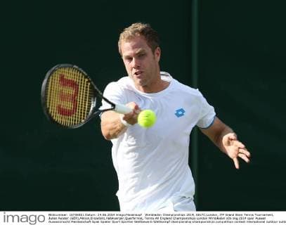 Wimbledon Championships 2014, AELTC,London, ITF Grand Slam Tennis Tournament, Julian Reister (GER),Aktion,Einzelbild,Halbkoerper,Querformat,
