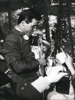 Feb. 02, 1956 - The shoulder-rider of Cortina. When Toni Sailer (TONI SAILER) of Austria won his 3rd gold medal in Cortina, hundreds of fans took him on their shoulders. Up there he was forced to give his signature again and again.  - ZUMAk09