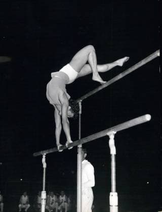 Jun. 25, 1957 - Olympic gymnast Agnes Keleti on uneven bars  - ZUMAk09
