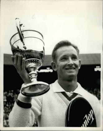 Jun. 06, 1962 - Laver wins Wimbledon Title again. Photo shows Rod Laver holds his trophy presented by the Queen after he won the men s singles title at Wimbledon for the second year in succession today, after beating fellow Australian M. Mulligan 6-2, 6-2, 6-1.  - ZUMAk09