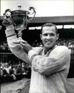 Jul. 07, 1963 - McKinley wins Wimbledon: Chuck McKinley of America won the Men s Singles title at Wimbledon this afternoon when he best Frank Stolle of Australia 9-7, 6-1, 6-4. Photo shows smiles from Chuck McKinley as he holds his cup after his victory.  - ZUMAk09