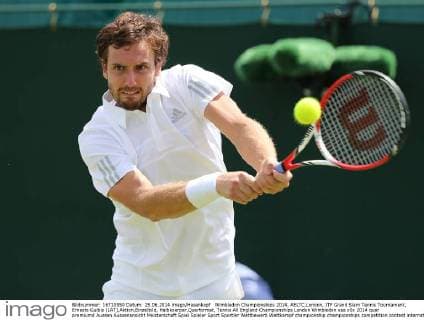 Wimbledon Championships 2014, AELTC,London, ITF Grand Slam Tennis Tournament, Ernests Gulbis (LAT),Aktion,Einzelbild, Halbkoerper,Querformat,