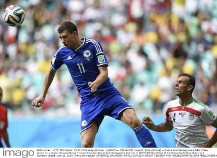 (140625) -- SALVADOR, June 25, 2014 (Xinhua) -- Bosnia And Herzegovina s Edin Dzeko jumps for a header during a Group F match between Bosnia And Herzegovina and Iran of 2014 FIFA World Cup at the Arena Fonte Nova Stadium in Salvador, Brazil, June 25, 2014. (Xinhua Yang Lei) (SP)BRAZIL-SALVADOR-WORLD CUP 2014-GROUP F-BOSNIA AND HERZEGOVINA VS IRAN 