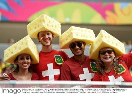 (140625) -- MANAUS, June 25, 2014 (Xinhua) -- Fans of Switzerland pose before a Group E match of 2014 FIFA World Cup at the Arena Amazonia Stadium in Manaus on June 25, 2014.(Xinhua LiuxDawei)(pcy) (SP)MANAUS-WORLD CUP 2014- 