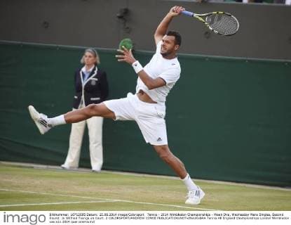 Tennis - 2014 Wimbledon Championships - Week One, Wednesday Mens Singles, Second Round: Jo Wilfried Tsonga on Court. 2 COLORSPORT ANDREW COWIE 