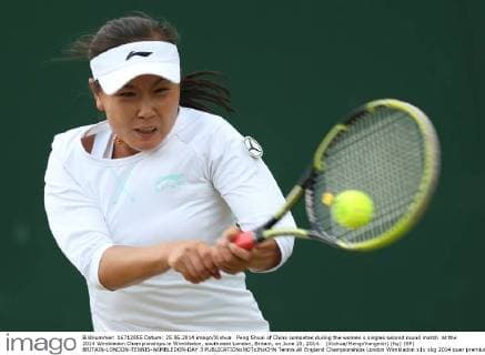 Peng Shuai of China competes during the women s singles second round match at the 2014 Wimbledon Championships in Wimbledon, southwest London, Britain, on June 25, 2014. (Xinhua MengxYongmin) (hy) (SP) BRITAIN-LONDON-TENNIS-WIMBLEDON-DAY 3 