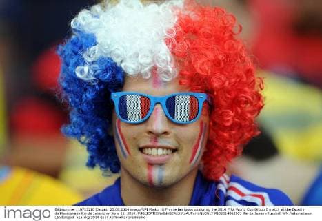 A France fan looks on during the 2014 FIFA World Cup Group E match at the Estadio do Maracana in Rio de Janeiro on June 25, 2014.  RIO2014062501
