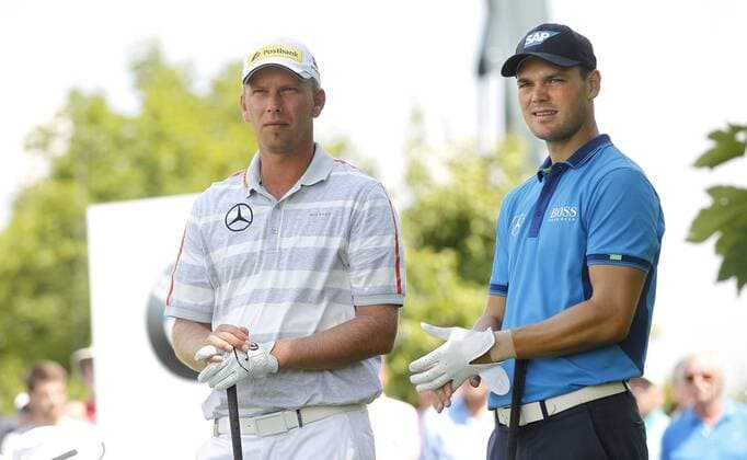 26.06.2014, Pulheim bei Köln: Deutschlands Martin Kaymer (R) und Marcel Siem zusammen beim Golfturnier BMW International Open auf Gut Lärchenhof.