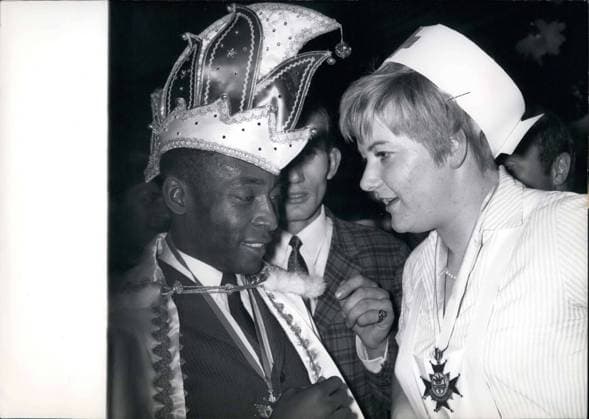 Feb. 22, 1968 - The Athlete s Ball, or Sportlerball, was held by a prominent magazine in Munich and attracted VIPs from across the board, from politicians to, of course, athletes. The prince of the ball was Brazilian soccer wonder Pele. Dressed as a nurse is the sportswoman of the year, Liesel Westermann.  - ZUMAk09