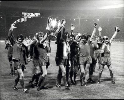 May 11, 1978 - Liverpool beat Bruges in the European Cup Final at Wembley: Liverpool The European Cup Holders, Retained the cup when they beat Bruges of Belgium by 1-0 in the Final at Wembley Stadium last night. Picture Shows: The Liverpool team Run round with the cup they are L-R Jimmy case, Phil Neal, Ray Olemence, Ray Kennedy, Capt, Emlyn Hughes, and Kenny Daiglish who scored the winner.  - ZUMAk09