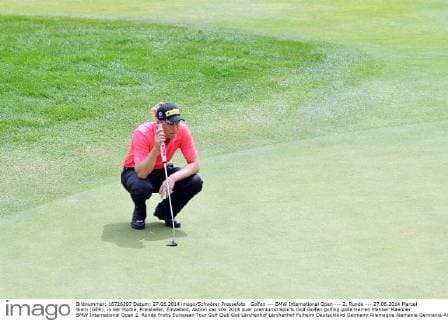 Golfen --- BMW International Open --- 2. Runde --- 27.06.2014 Marcel Siem (GER), in der Hocke, Freisteller, Einzelbild, Aktion