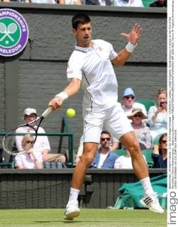 27 06 2014. London, United Kingdom. Novak Djokovic in action on day five of the Wimbledon Tennis Championships . StephenxLockx xi-Images  IIM-2528-0022