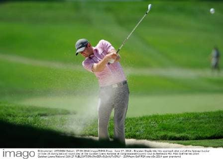 June 27, 2014 - Brendan Steele hits hits approach shot out of the fairway bunker on hole 15 during second round play at the Quicken Loans National at Congressional Country Club in Bethesda MD. PGA Golf Herren 2014: Quicken Loans National JUN 27 - ZUMAcjm