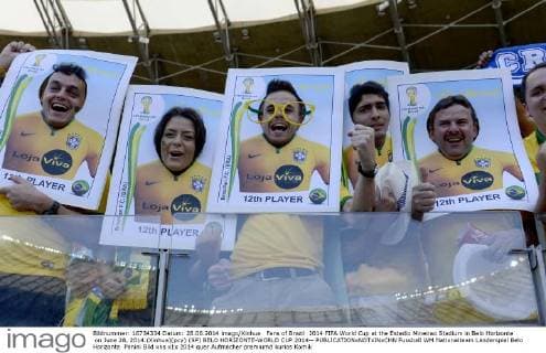 Fans of Brazil 2014 FIFA World Cup at the Estadio Mineirao Stadium in Belo Horizonte on June 28, 2014.(Xinhua)(pcy) (SP) BELO HORIZONTE-WORLD CUP 2014-- 