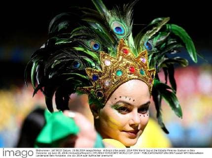 A Brazil s fan poses 2014 FIFA World Cup at the Estadio Mineirao Stadium in Belo Horizonte on June 28, 2014.(Xinhua LixMing)(rh) (SP) BELO HORIZONTE-WORLD CUP 2014-- 