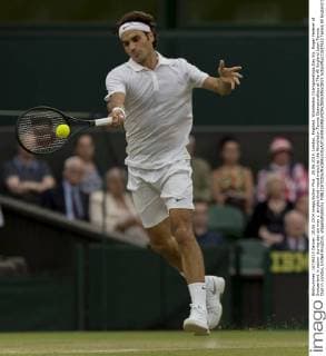 28.06.2014. London, England. Wimbledon Championships Day Six. Roger Federer of Switzerland in action during day six men s singles third round match at the Wimbledon Tennis Championships at The All England Lawn Tennis Club in London, United Kingdom. xNigelxWaldronx  ActionPlus11537652