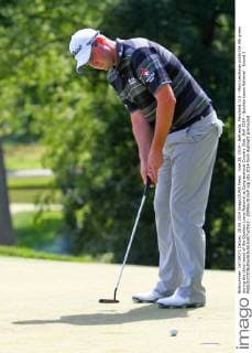 June 28, 2014 - Bethesda, Maryland, U.S - Marc Leishman putts the 9th green during the third round of the Quicken Loans National at Congressional Country Club. Golf 2014 - Quicken Loans National - Round 3 - ZUMAw10