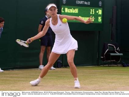 Tennis - 2014 Wimbledon Championships - Week Two, Monday Womens Singles, Third Round: Caroline Wozniacki on Court 12. 