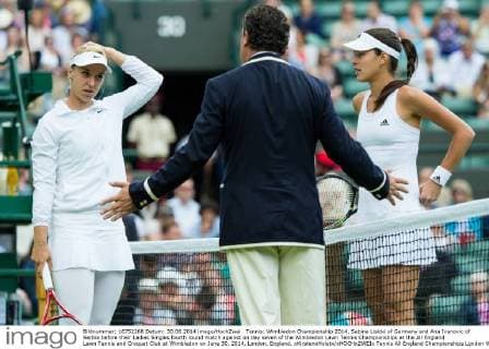 Tennis: Wimbledon Championship 2014, Sabine Lisicki of Germany and Ana Ivanovic of Serbia before their Ladies Singles fourth round match against on day seven of the Wimbledon Lawn Tennis Championships at the All England Lawn Tennis and Croquet Club at Wimbledon on June 30, 2014, London, England. xKirstenxHolstx xHOCHxZWEIx