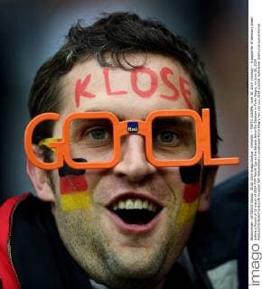 (140630) -- PORTO ALEGRE, June 30, 2014 (Xinhua) -- A supporter of Germany poses before a Round of 16 match of 2014 FIFA World Cup at the Estadio Beira-Rio Stadium in Porto Alegre, on June 30, 2014. 