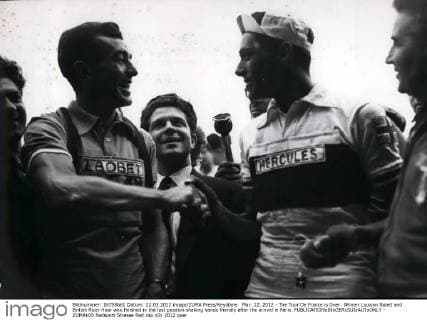 Mar. 22, 2012 - The Tour De France is Over: Winner Louison Bobet and British Ricer Hoar who finished in the last position shaking hands friendly after the arrival in Paris.  - ZUMAk09