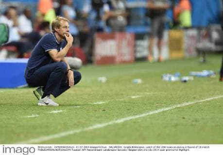 SALVADOR, Jürgen Klinsmann, coach of the USA looks on during a Round of 16 match 