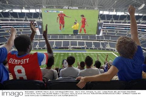 July 1, 2014 - Arlington, TX, USA - Justen Woody, left, and Robert Driskill both of Fort Worth, Texas, cheer at AT&T Stadium in Arlington, Texas, as soccer USA fans - ZUMAm67