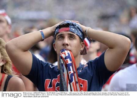 USA soccer fan Gino Smith watches the final minutes of the World Cup round of 16 match at Soldier Field on July 1, 2014 in Chicago.  CHI2014070129