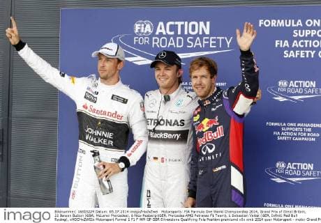 Motorsports: FIA Formula One World Championship 2014, Grand Prix of Great Britain, 22 Jenson Button (GBR, McLaren Mercedes), 6 Nico Rosberg (GER, Mercedes AMG Petronas F1 Team), 1 Sebastian Vettel (GER, Infiniti Red Bull Racing), xHOCHxZWEIx