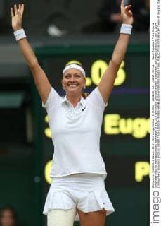(140705) -- LONDON, July 5, 2014 (Xinhua) -- Czech Republic s Petra Kvitova celebrates after the women s singles final match at the 2014 Wimbledon Championships in Wimbledon, southwest London, on July 5, 2014. (Xinhua Meng Yongmin) (FOCUS) (SP)BRITAIN-LONDON-TENNIS-WIMBLEDON-WOMEN S SINGLES FINAL 