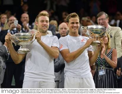 Tennis - 2014 Wimbledon Championships - Week Two, Saturday Mens Doubles Final Vasek Pospisil and Jack Sock v Bob Bryan and Mike Bryan Vasek Pospisil and Jack Sock with their winners trophies on Centre Court. 
