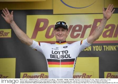 20140710 - REIMS, FRANCE: German Andre Greipel of Lotto - Belisol celebrates on the podium after winning stage 6 of the 101st edition of the Tour de France cycling race, 194 km from Arras to Reims, on Thursday 10 July 2014. DAVIDxSTOCKMAN  premiumd 2863