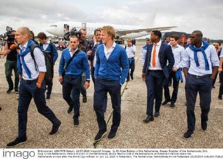 (L-R) Arjen Robben of the Netherlands, Wesley Sneijder of the Netherlands, Dirk Kuijt of the Netherlands, Patrick Kluivert of the Netherlands, Bruno Martins Indi of the Netherlands at Rotterdam Airport where the Netherlands arrived after the World Cup in Brazil on July 13, 2014 in Rotterdam, The Netherlands. Netherlands Arrival Rotterdam 2013 2014 xVIxxIVx 2450680